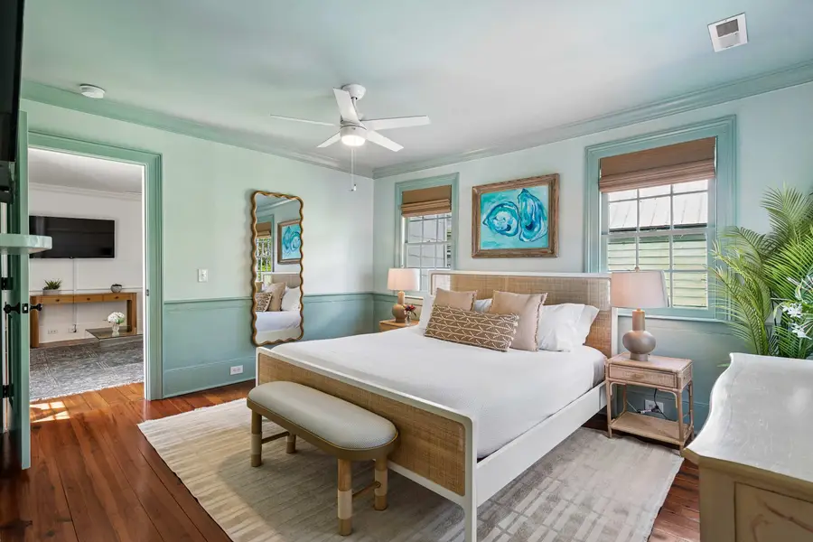 Bedroom #2: Designed with a king bed, Smart TV, beautiful natural light, and a stylish vanity that doubles as a workspace.