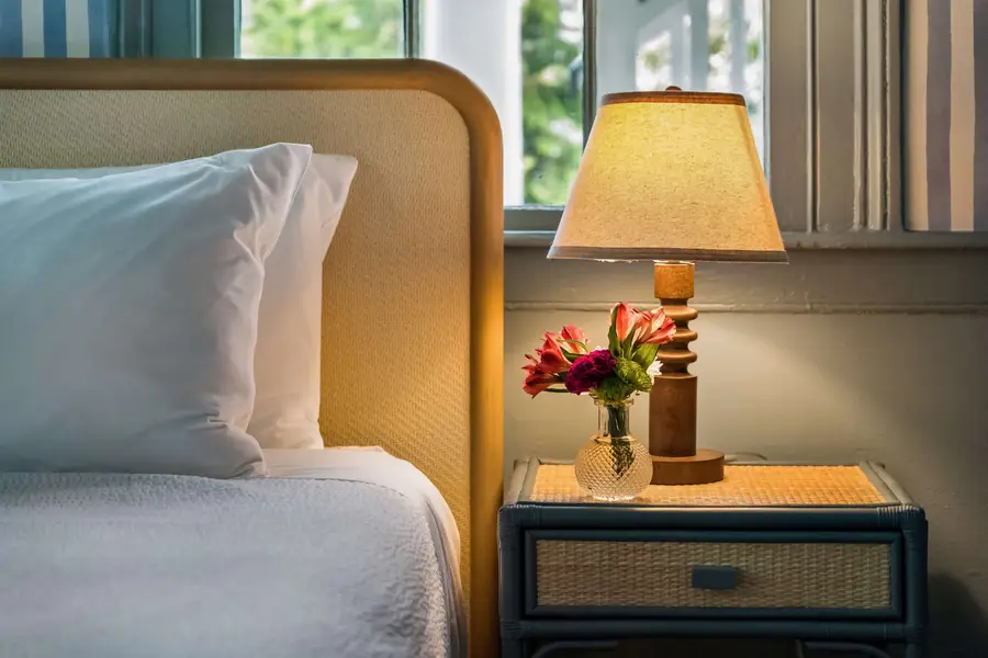 Bedroom #3: Features a king bed, Smart TV, abundant natural light, and a dedicated vanity/work desk for a comfortable and versatile stay.