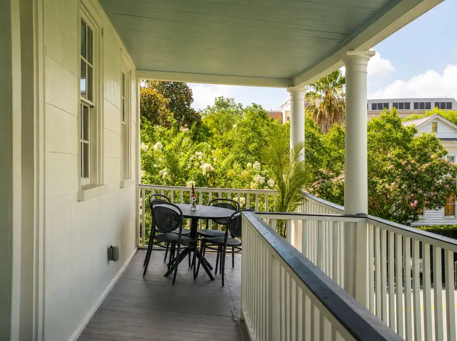 Start your day with coffee or end it watching the sunset from the porch, featuring cozy seating for four and breathtaking views you'll never tire of.