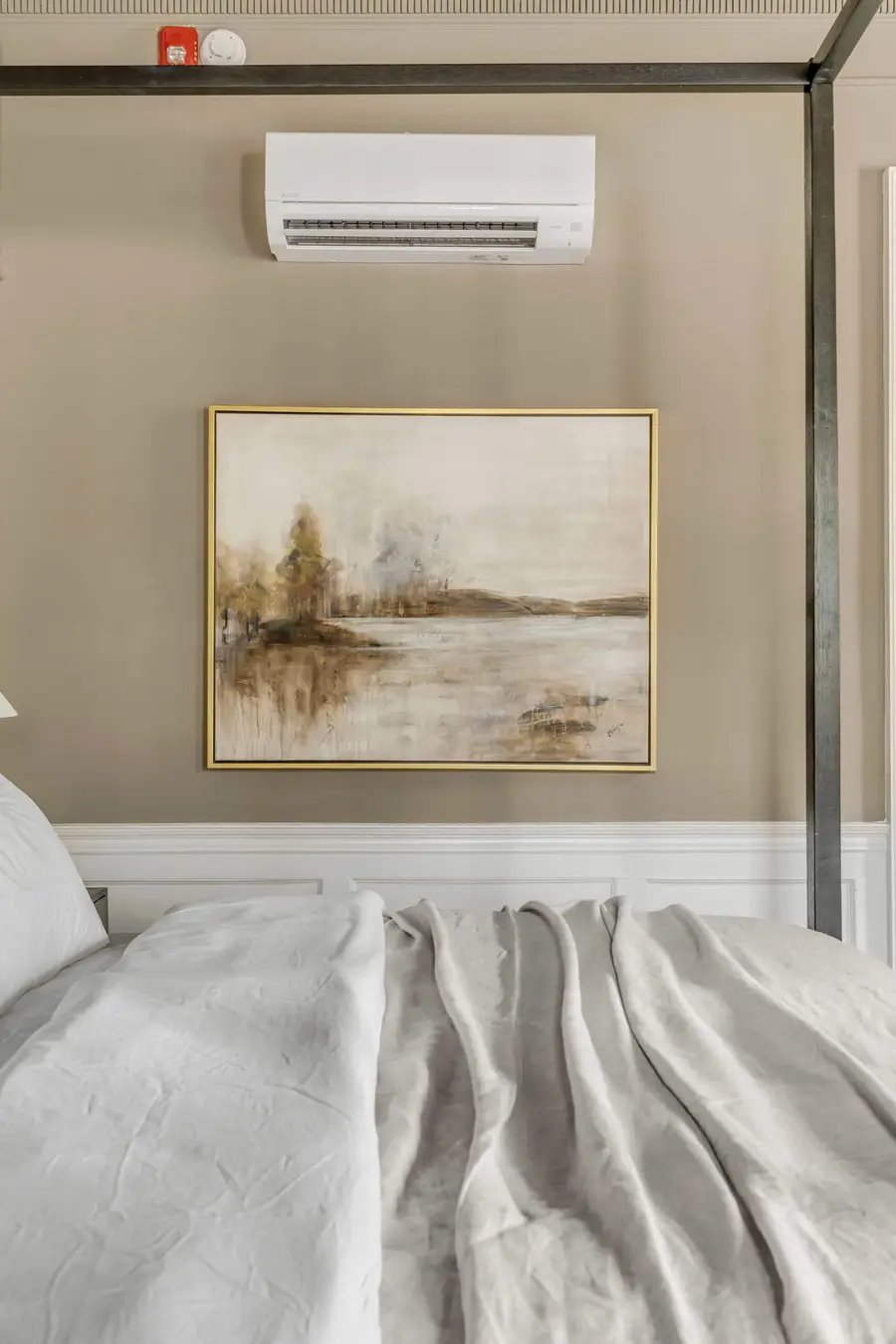 Bedroom #1: Bright, elegant, and inviting, this king suite offers a plush bed, cozy sofa, TV, and plenty of natural light for a truly relaxing stay.