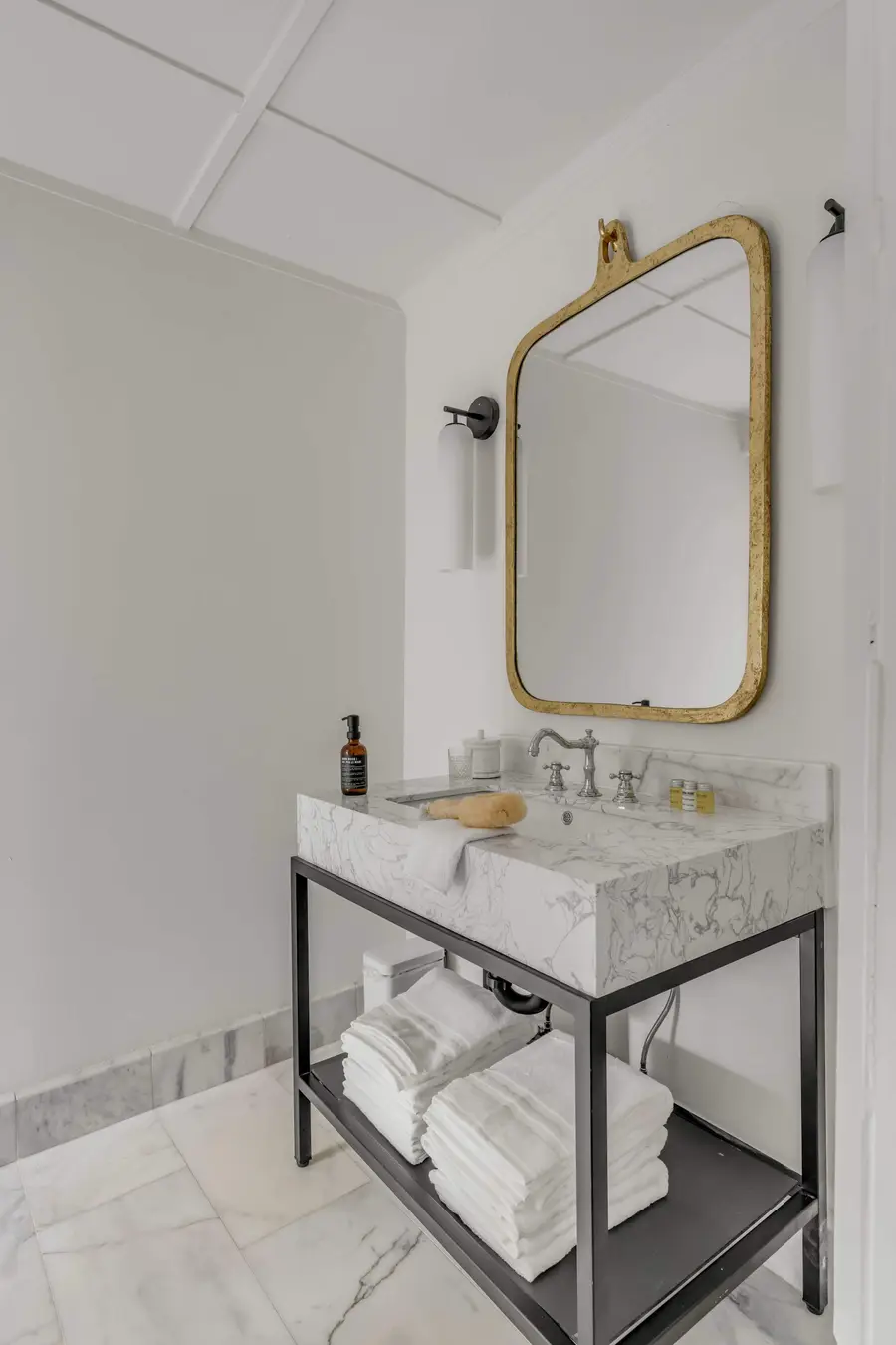 Bathroom #1: Refresh in a beautifully designed bathroom featuring a spacious walk-in shower and elegant finishes.