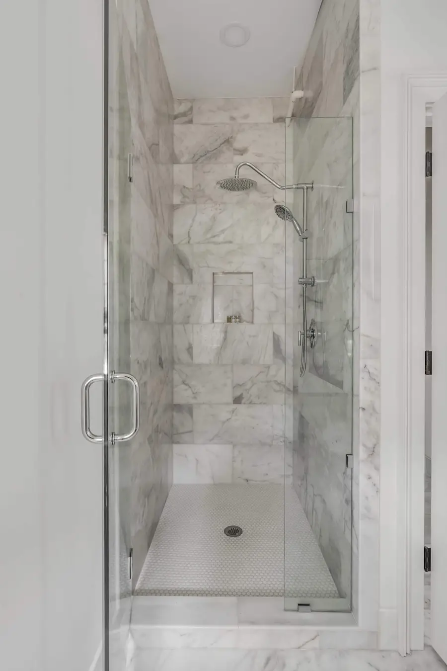 Bathroom #1: Refresh in your private ensuite bathroom featuring a spacious walk in shower and elegant finishes.