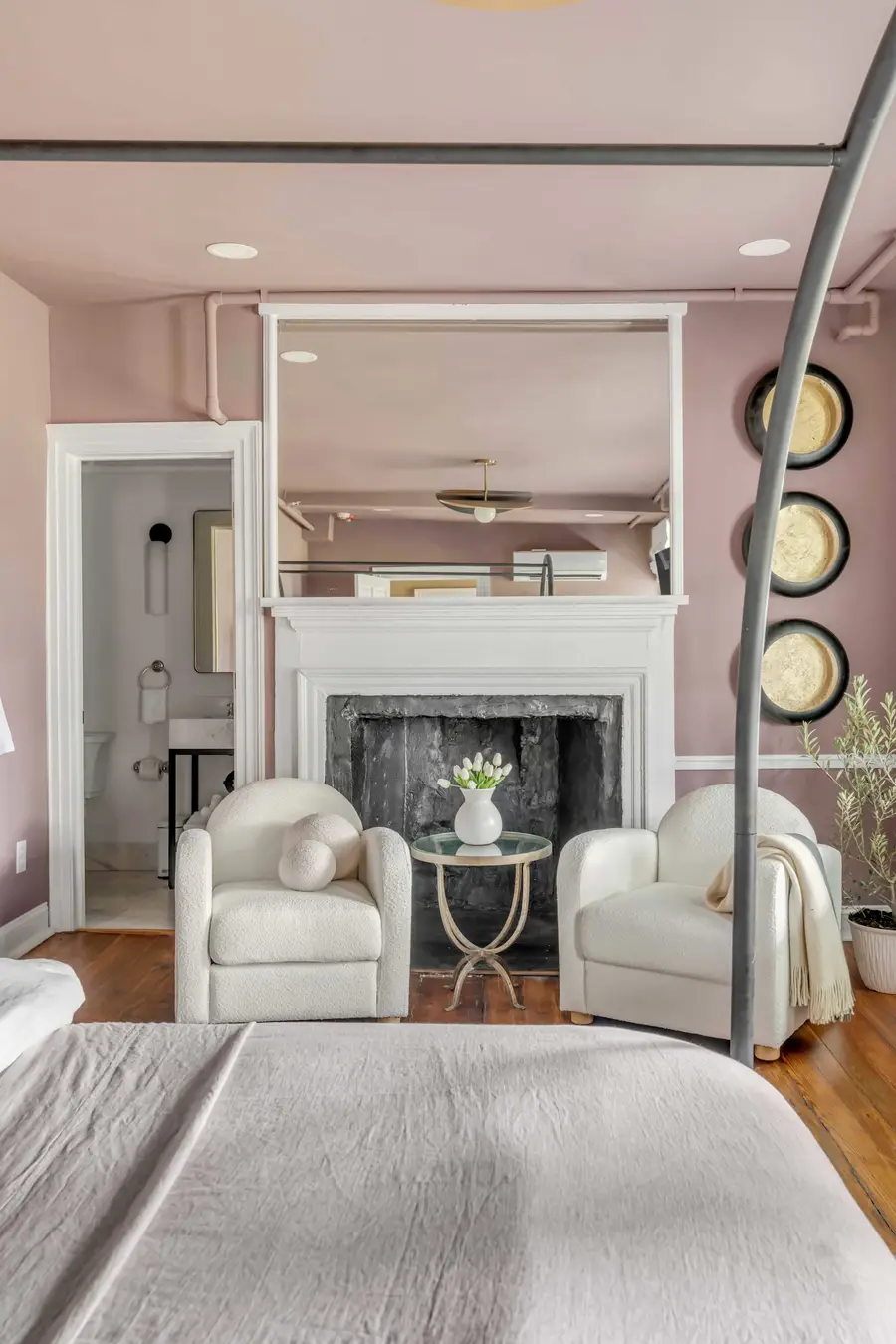 Bedroom #1: Unwind in a plush king bed with a private ensuite bathroom and a cozy sitting area for two, perfect for enjoying your morning coffee or relaxing after a day of exploring.