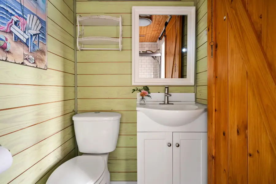 Bathroom #4: Offers a shower tub combo, providing comfort and convenience for every guest.