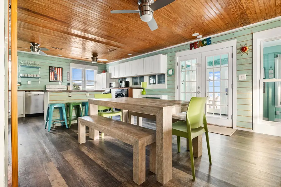 Gather around the bar table with seating for four or enjoy meals together at the dining table with seating for eight.