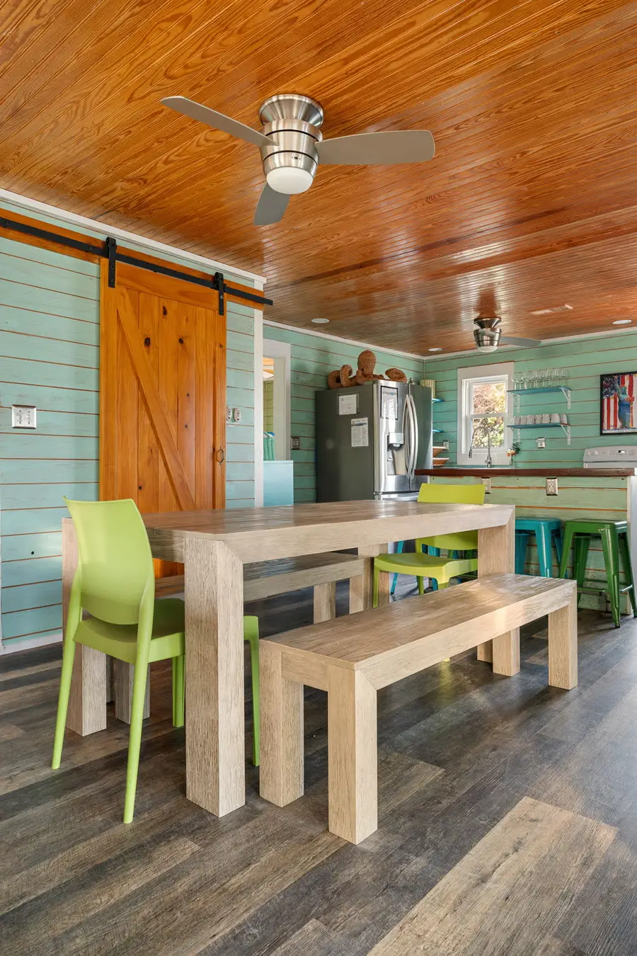 Gather around the bar table with seating for four or enjoy meals together at the dining table with seating for eight.