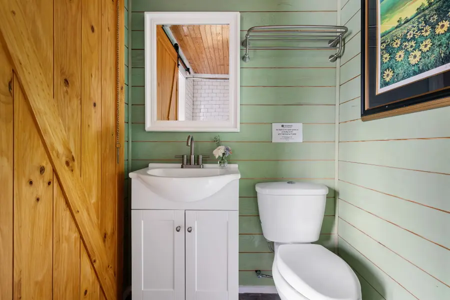 Bathroom #4: Offers a shower tub combo, providing comfort and convenience for every guest.