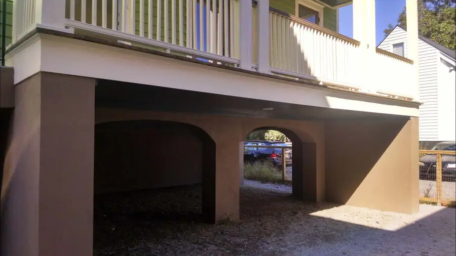 Two covered parking spaces (COMPACT VEHICLES ONLY)