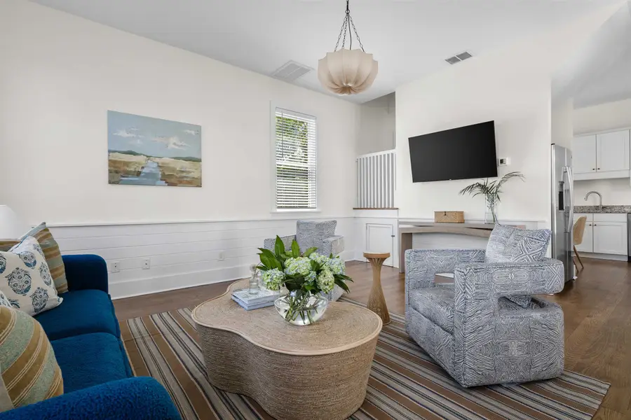 A large, inviting living room with plenty of space for the whole group to gather and unwind together!