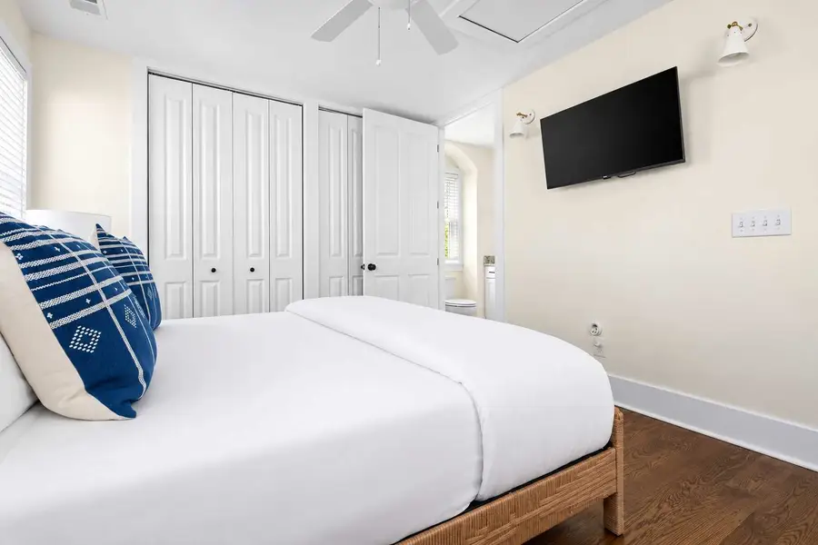 Bedroom 1: King Bed + TV + Ceiling Fan