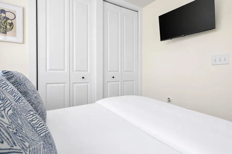 Bedroom 2: Double Bed + TV + Ceiling Fan