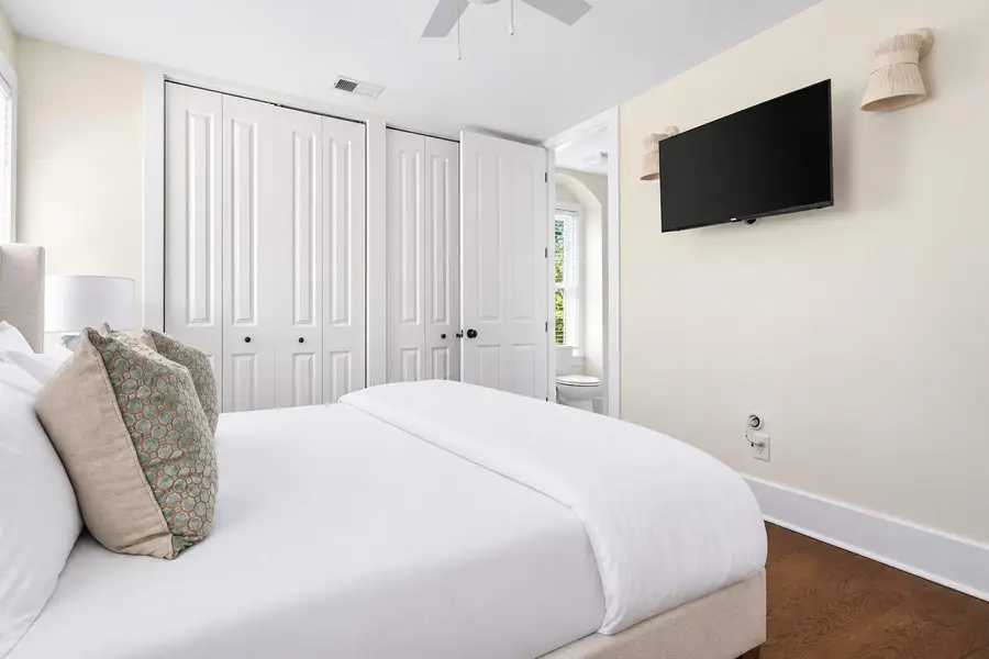 Bedroom 1: King Bed + TV + Ceiling Fan