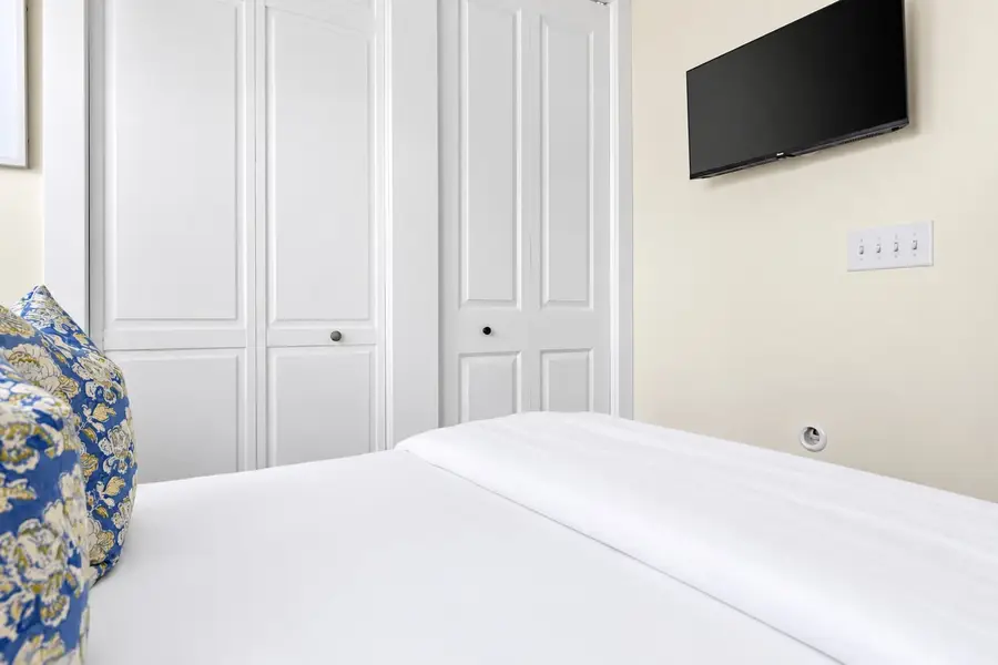 Bedroom 2: Double Bed + TV + Ceiling Fan