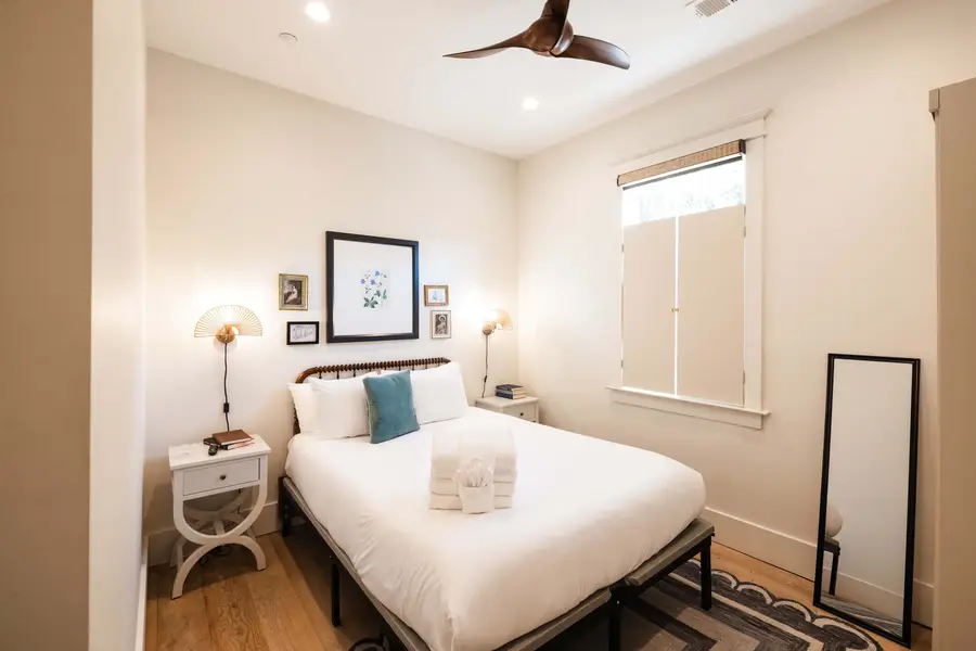 Bedroom 2: Queen Bed + TV