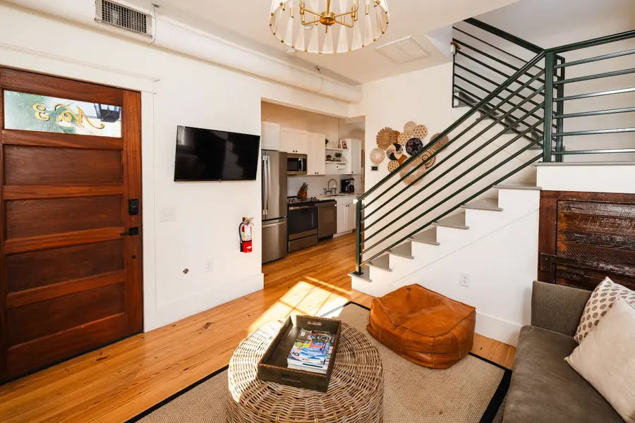 Spacious living room with seating for your group :)
