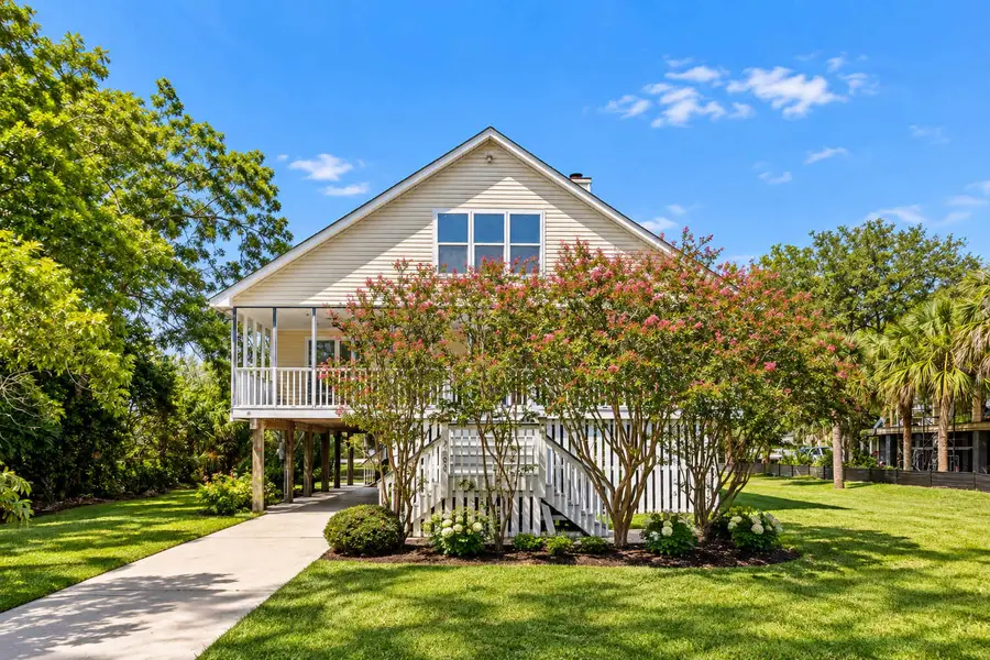 Exterior of the home with a driveway that can fit 4 vehicles 
