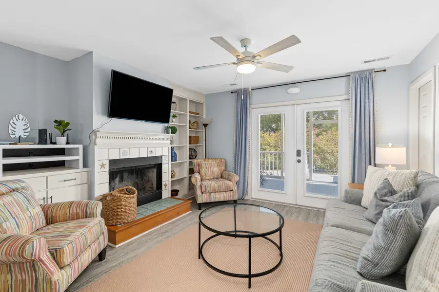 Spacious living room with a smart TV and plenty of seating 