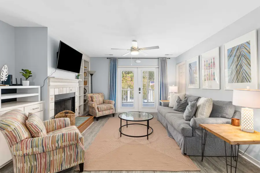 Spacious living room with a smart TV and plenty of seating 