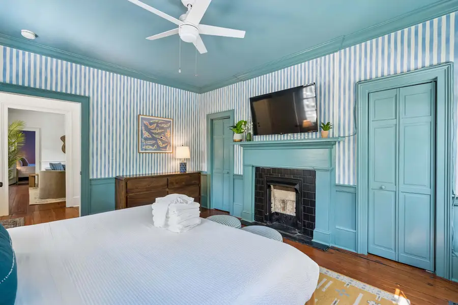 Bedroom #1: King bed + TV + ceiling fan