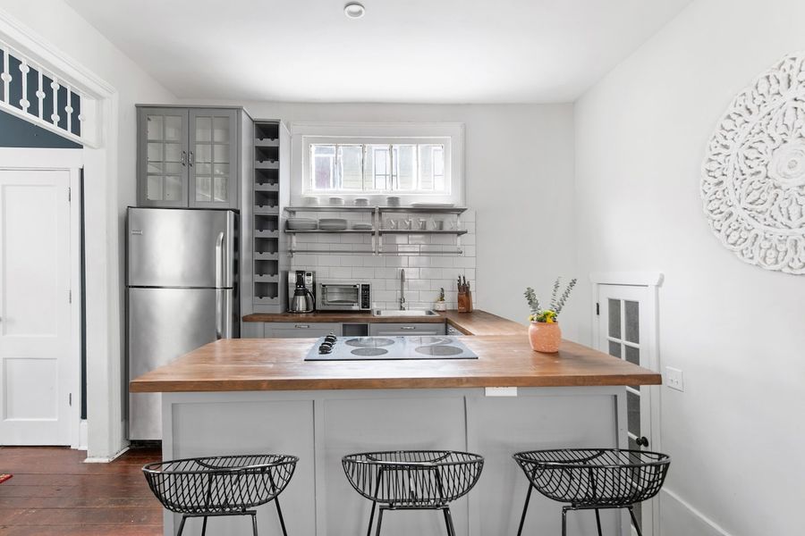 Fully equipped kitchen with everything you need to cook a meal + additional seating for 3 at the island!